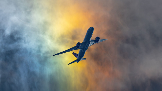 Plane flying sky rainbow clouds free wallpaper - medium preview image