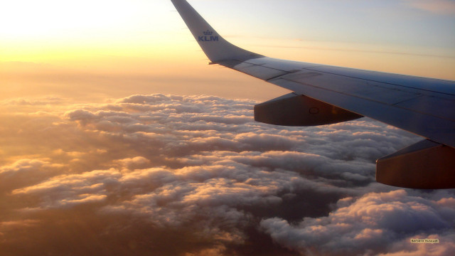 Plane wing clouds sunset sunrise free wallpaper - medium preview image