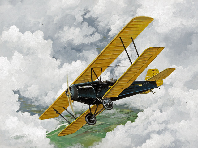 Yellow black biplane flying clouds free wallpaper - medium preview image