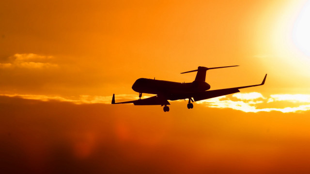 Plane flying sky sunset sun free wallpaper - medium preview image