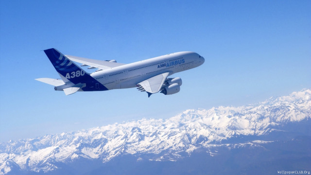Large passenger jet mountain range free wallpaper - medium preview image