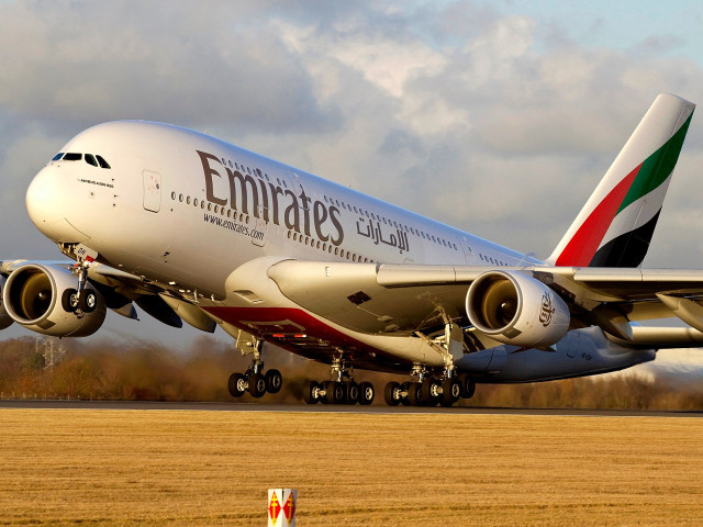 Jetliner taking off airport runway #6 free wallpaper - medium preview image