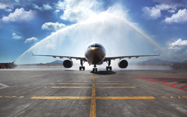 Jet runway skyline mountain ocean free wallpaper - medium preview image