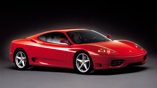 Red sports car studio photo free wallpaper - medium preview image