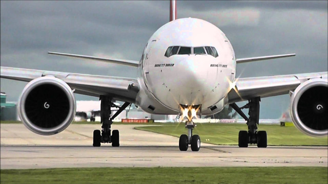 Jetliner airport runway cloudy sky free wallpaper - medium preview image