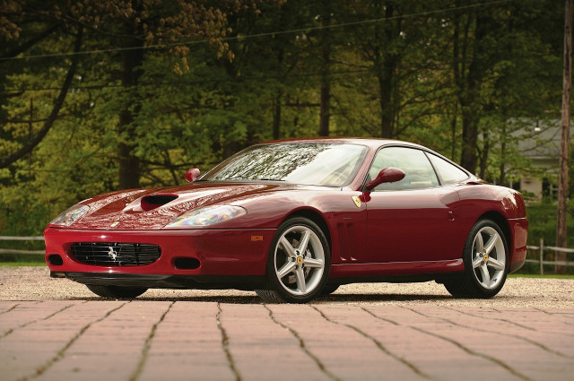 Red sports car driveway forest free wallpaper - medium preview image