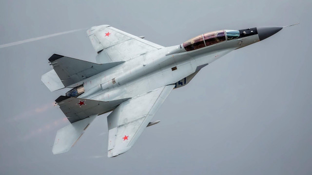 Fighter jet cloudy sky red #7 free wallpaper - medium preview image