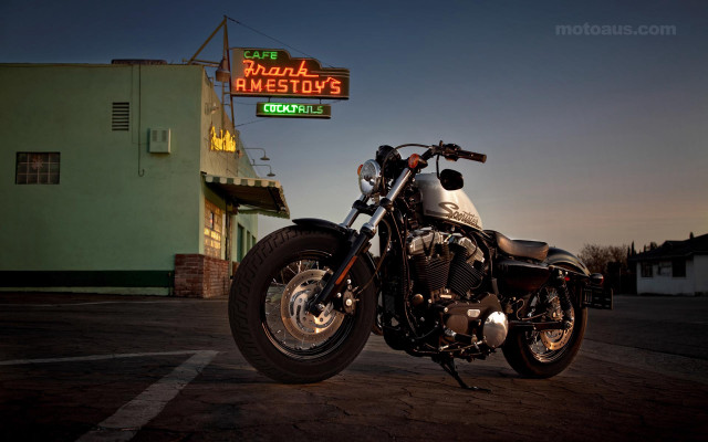 Motorcycle parked neon sign bar free wallpaper - medium preview image