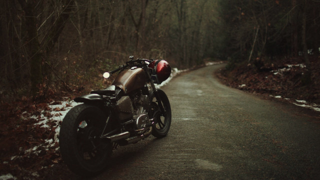 Motorcycle snowy woods tiltshift cinematic free wallpaper - medium preview image