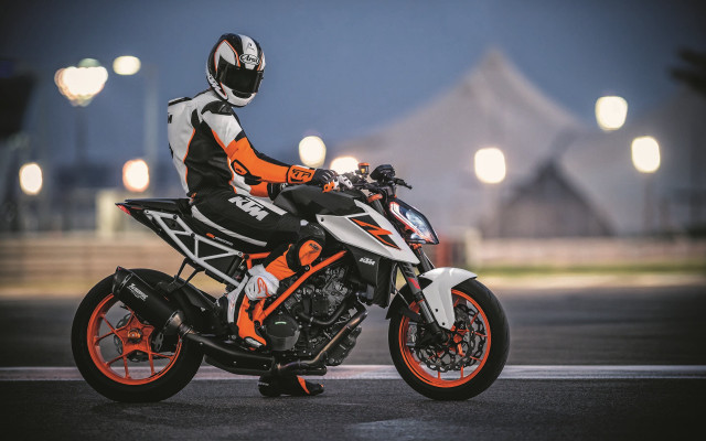Motorcycle person night street lights free wallpaper - medium preview image