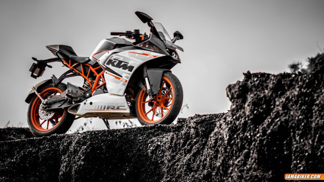 Motorcycle rockwall hill grass night free wallpaper - medium preview image