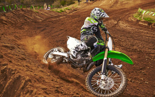 Dirt bike rider track spectators - the stand behind free wallpaper