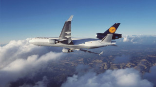 Jetliner flying blue sky clouds 6 - international typographic style free wallpaper
