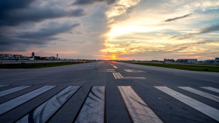Runway sunset clouds sky background - a sunset in the background free wallpaper