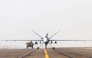 Large airplane runway truck background - a plane in the background free wallpaper
