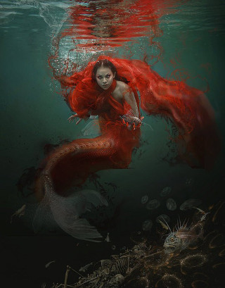 Woman red dress swimming underwater - dark free wallpaper