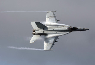 Fighter jet cloudy smoke flying - a cloudy sky free wallpaper