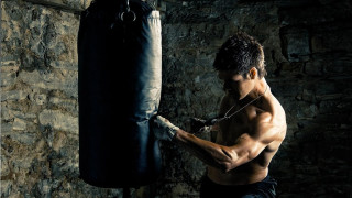 Man boxing practice gym punching - a gym free wallpaper