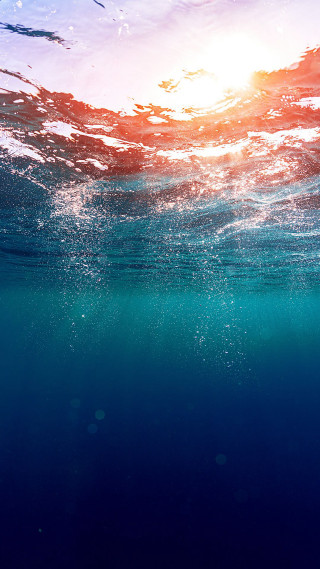 Surfboard underwater sunset sunlight ocean - the ocean free wallpaper