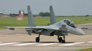 Fighter jet runway ready takeoff - front view free wallpaper