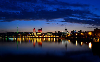 City skyline night river bridge 21 - a bridge crossing over free wallpaper
