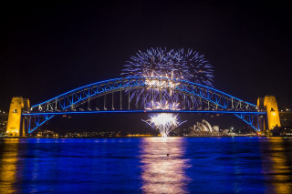 Blue bridge fireworks night boat - free new year wallpaper