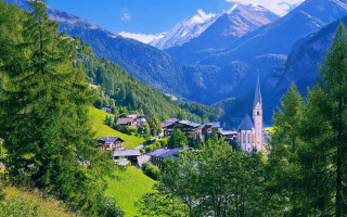 Village nestled mountains church foreground - a village free wallpaper