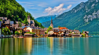 Village lake mountains trees church - a church free wallpaper
