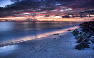 Beach rocky cliff water sunset - sunset free wallpaper