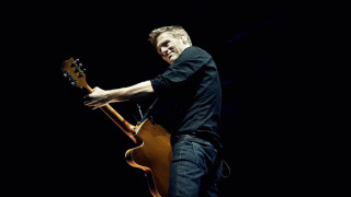 Man holding guitar smiling stage - stage free wallpaper