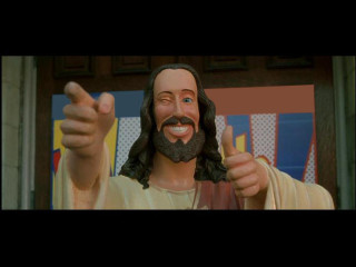 Jesus thumbs up smile statue - his face and chest free wallpaper