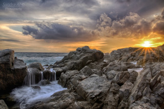 Rocky beach waterfall sunset cloudy 2 - sunrise free wallpaper