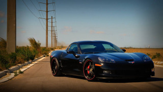 Black sports car power pole - near free wallpaper for desktop