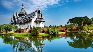 Large building pond trees blue - a large building free wallpaper