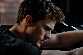 Man playing piano dark room - movie still free wallpaper