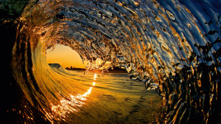 Breaking wave sunset golden water - the water free wallpaper