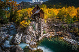 Wooden bridge cliff river autumn - free forest wallpaper