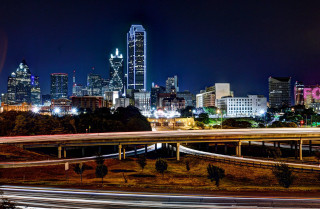 City skyline night freeway bridge - a city skyline in the background free wallpaper