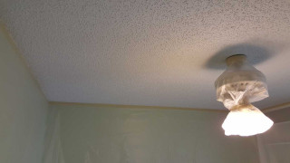 Bathroom light fixture white ceiling - a white wall behind free wallpaper