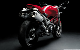 Red motorcycle dark room black 13 - a red motorcycle free wallpaper