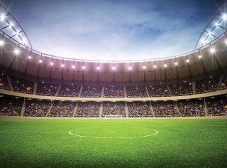 Soccer stadium green field sky - a soccer ball free wallpaper
