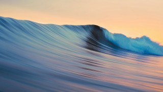 Breaking wave ocean sunset dawn 2 - a colorful sky in the background free wallpaper