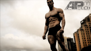 Muscular man city skyline tall - alexander kucharsky free wallpaper