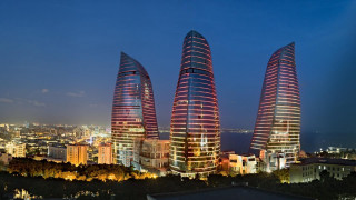 Tall buildings city night lights - architecture free wallpaper