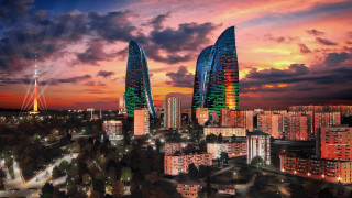 Tall buildings city sunset colorful - edi rama free wallpaper