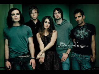 Group people green wall room - a group of people free wallpaper