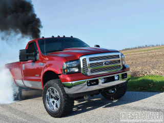 Red truck black smoke parked - a red truck free wallpaper