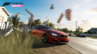 Red car driving street house - doc hammer free wallpaper
