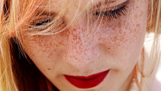 Freckled hair red lipstick smiling - pointillism free wallpaper