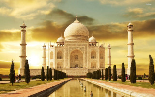 White building fountain trees sunset 2 - a large white building free wallpaper